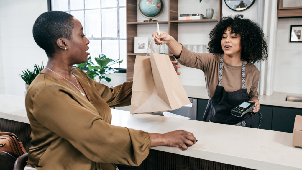 retailer behind counter
