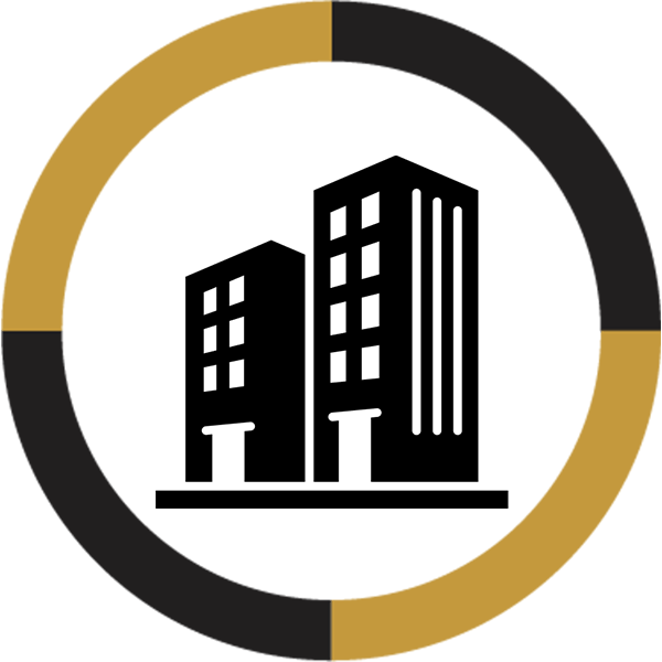 silhouette of 2 big commercial properties